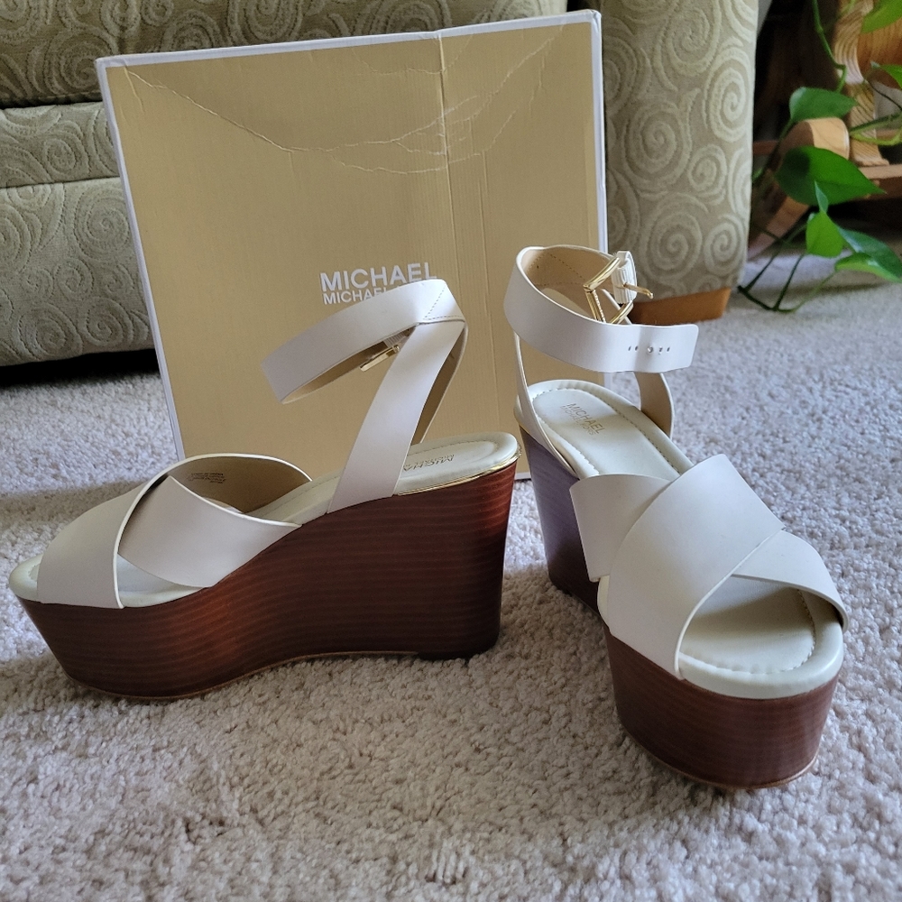.They are a cream platform wedges by Michael Kors.